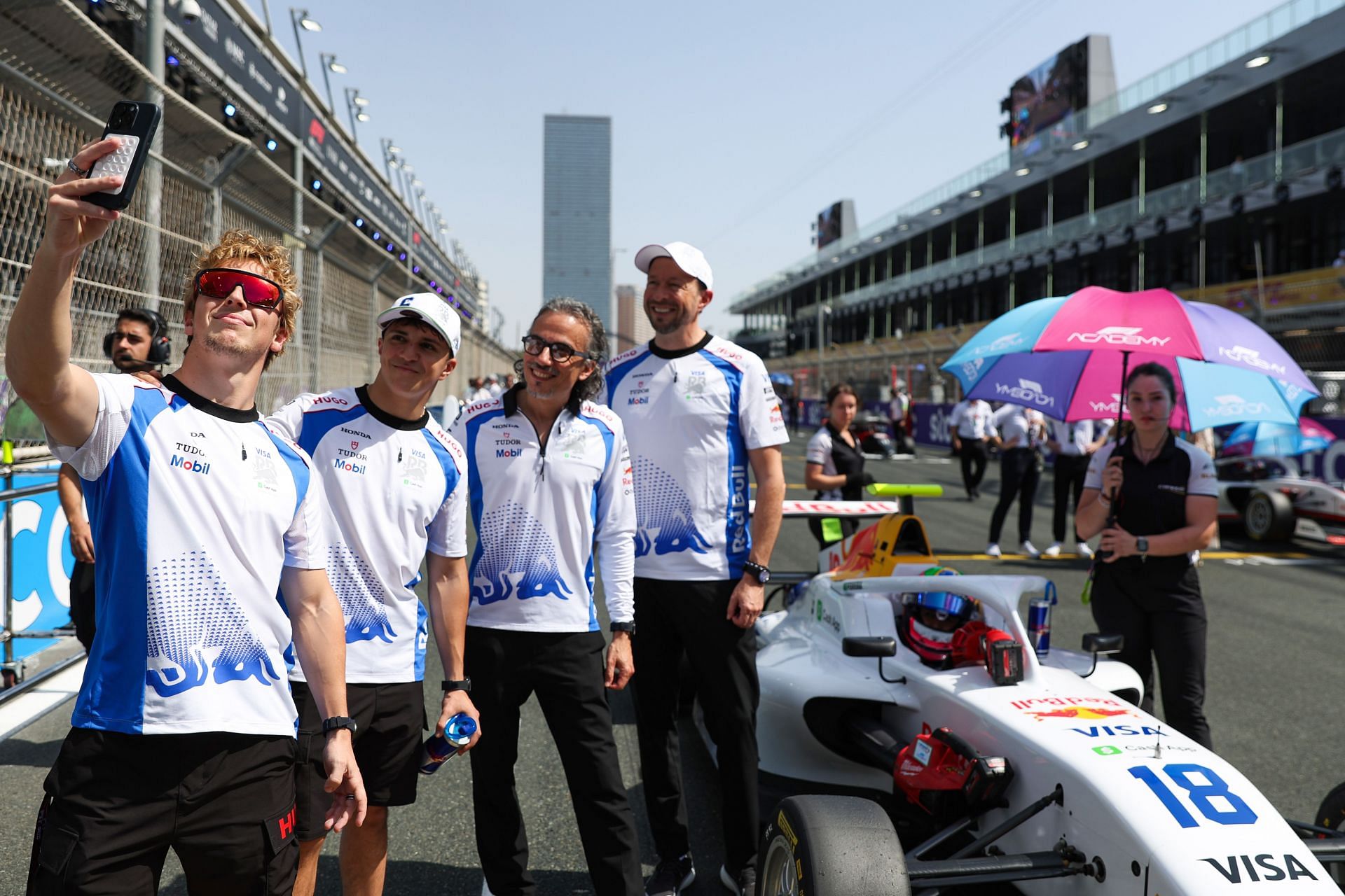 (L-R) Drivers Liam Lawson, Isack Hadjar, Racing Bulls Team Principal Laurent Mekies and CEO Peter Bayer during F1 Academy Round 2. Source: Getty